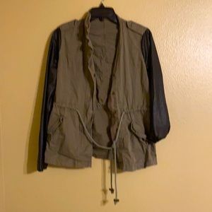 green with black sleeves long sleeve shirt